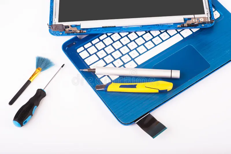 engineer repairs blue laptop pc computer screen replacement installs equipment cpu white background isolated 246718797